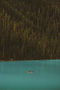 Canoeing-in-an-emerald-lake-on-a-hillside.jpg