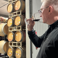 Kendall Mix barrel tasting the 2024 MocToe Cabernet Sauvignon from Elephant Mountain Vineyard