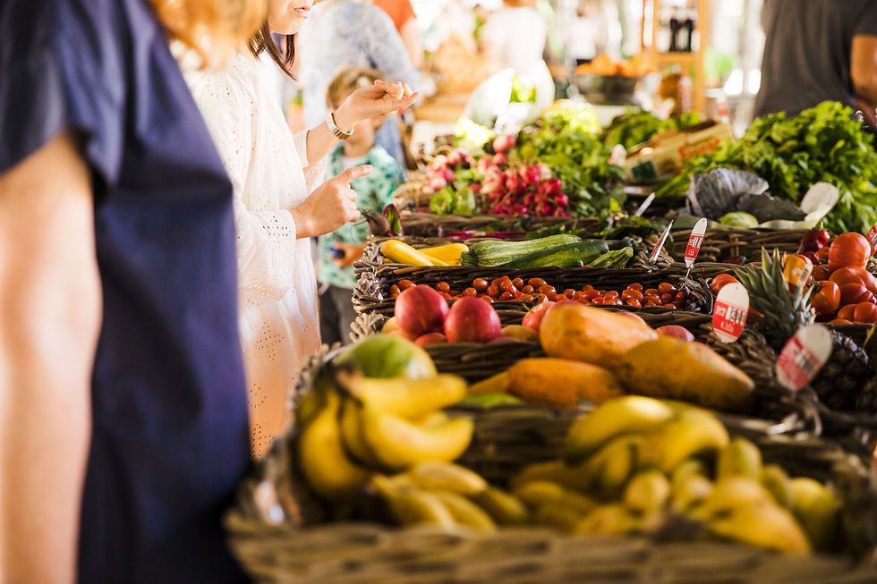 people-buying-vegetable-on-stall-at-the-market.jpg