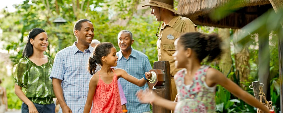 Girl scanning her MagicBand in Disney World