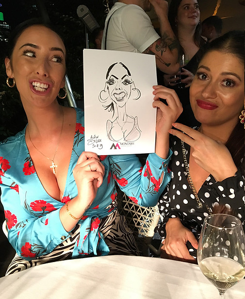Corporate entertainment and caricatures at a company party inBishopsgate, the City of London