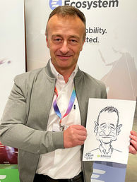 Caricature of a delegate at a trade show at Excel London