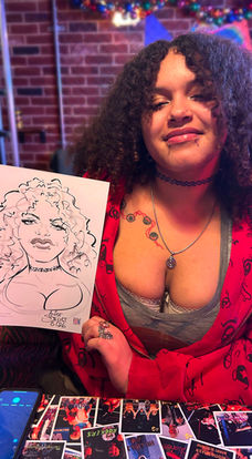 Smiling Christmas party guest holding up her caricature