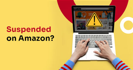 hands typing on laptop with the screen showing a warning or alert sign