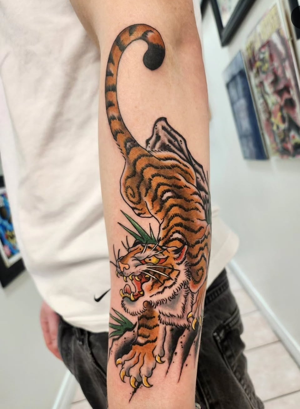 Japanese colour tiger tattoo on forearm by Timothy Strange