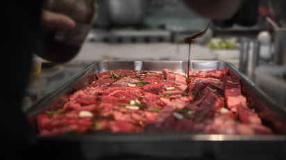 Chef preparing dish at Hidden Thaiger, Hội An 2