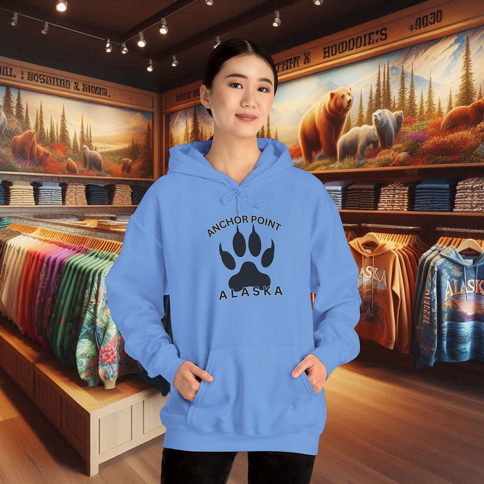 Thumbnail: Woman wearing blue hoodie with Anchor Point Alaska paw print; Anchor Point, Alaska Apparel Coastal-Inspired Comfort Hoodies.