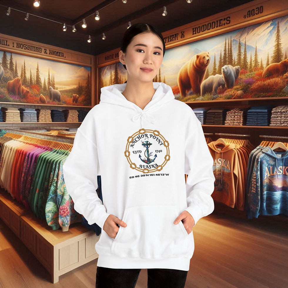 Thumbnail: Woman wearing Anchor Point, Alaska Apparel Coastal-Inspired Comfort Hoodie surrounded by clothing racks Wolf's Den Clothing