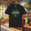 Thumbnail: Black Alligator Alcatraz t-shirt with print, shirts, tees, Novelty Apparel, Everglades background, Wolf's Den Clothing.