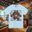 Thumbnail: Light blue t-shirt with a fierce bear graphic design. Battle Bears Graphic Tees.