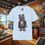 Thumbnail: Light blue t-shirt displaying a zombie bear graphic. Zombie Bear Apparel | Scary and Stylish T-Shirts.