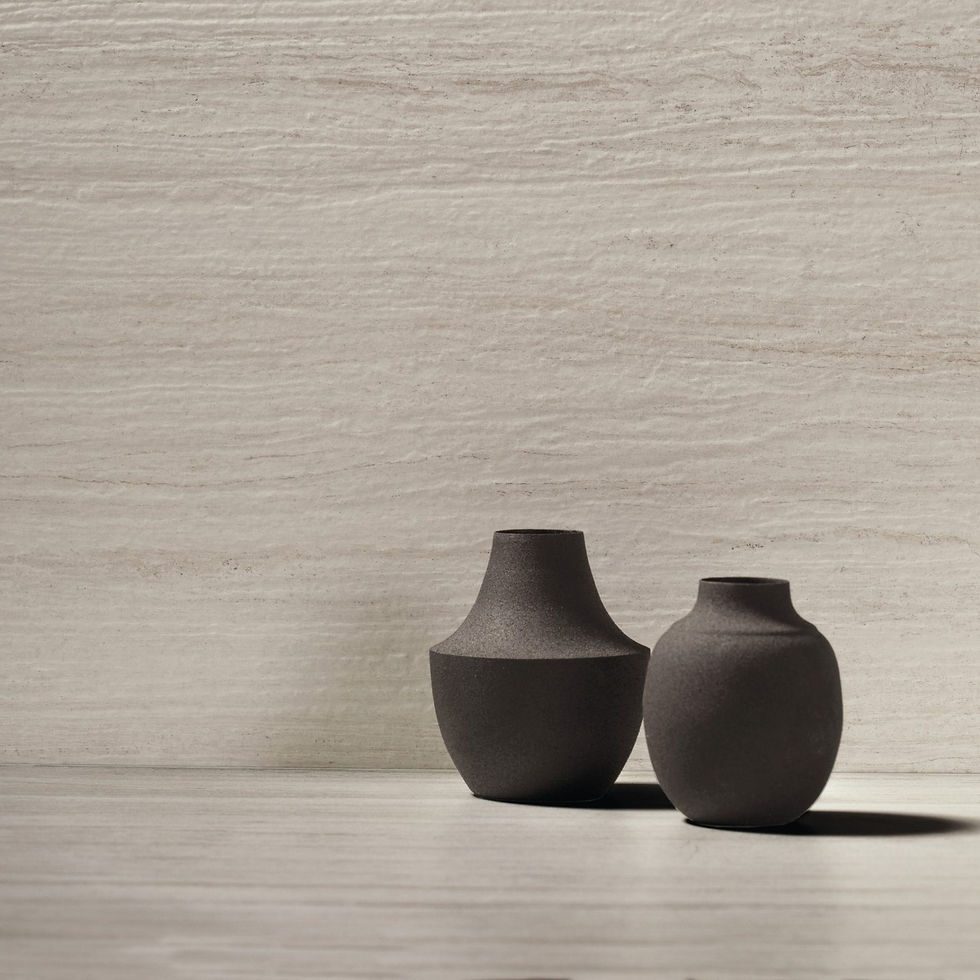 Thumbnail: two black vases on the floor paved with grey-white travertine style porcelain tiles