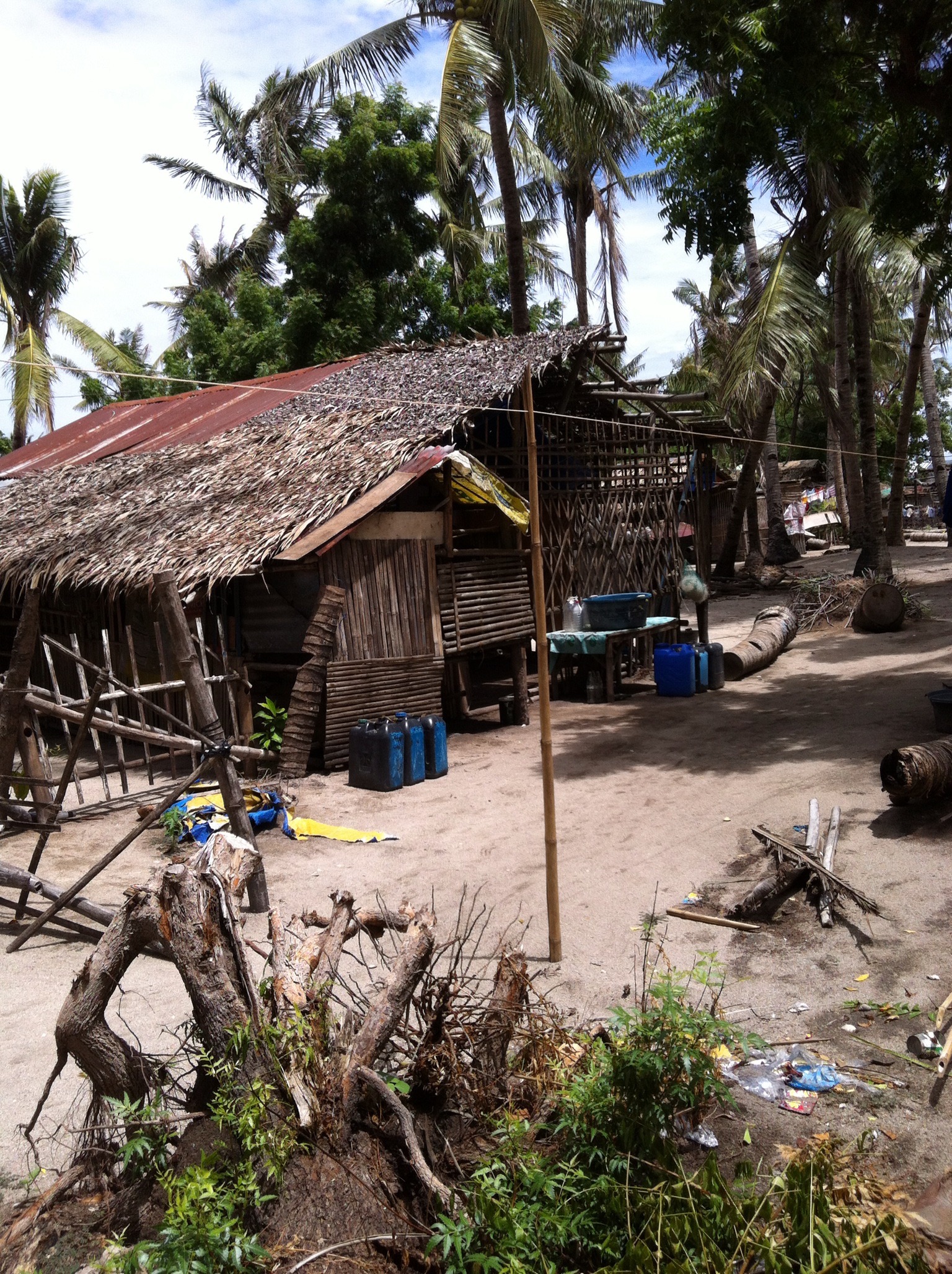 Village homes destroyed in cyclone