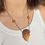 Thumbnail: Bronzed Conch Shell Necklace