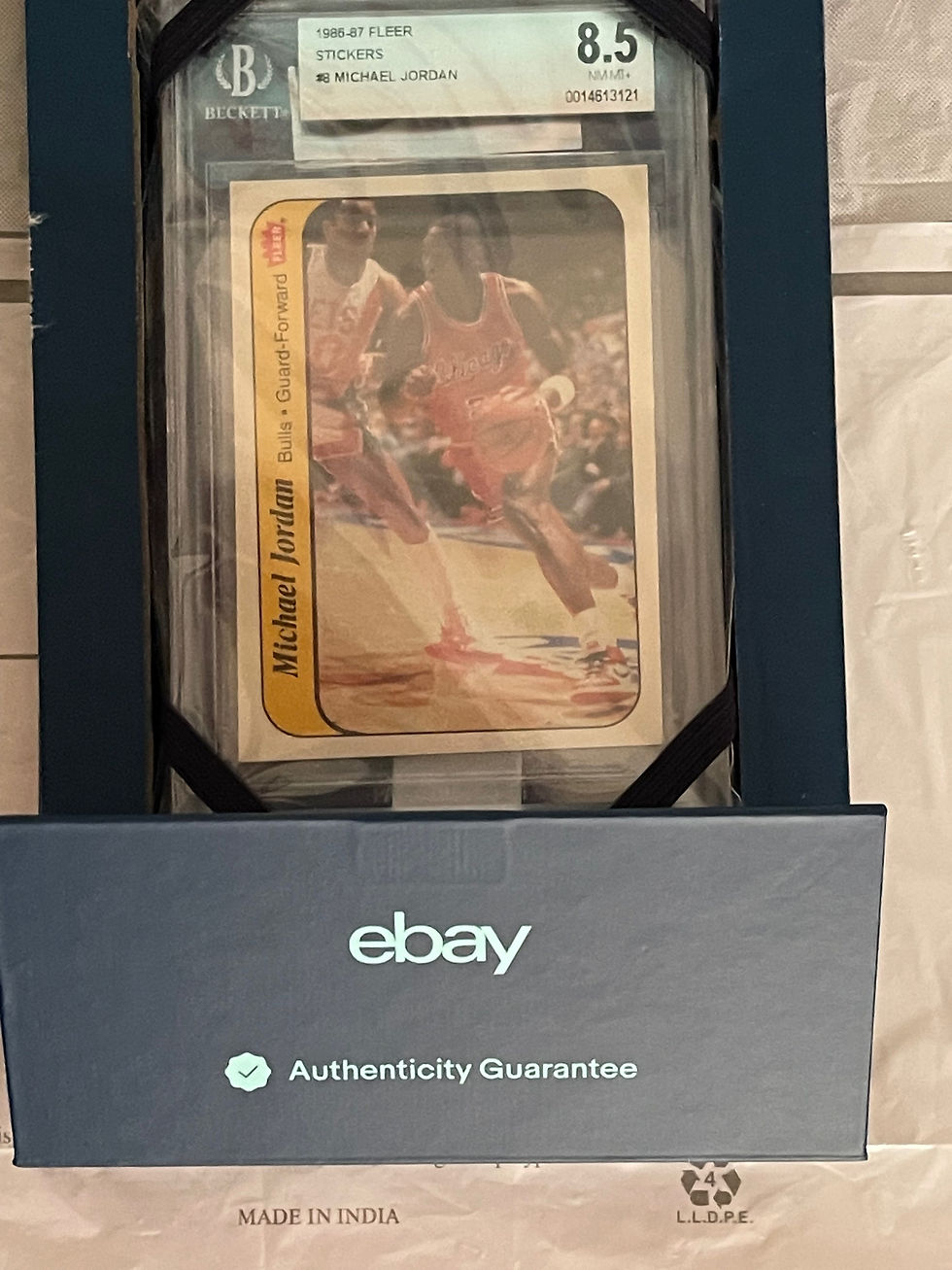 Thumbnail: 1986-87 Fleer MICHAEL JORDAN ROOKIE STICKER RC Bulls HOF #8 BGS 8.5 RARE GRADE!!