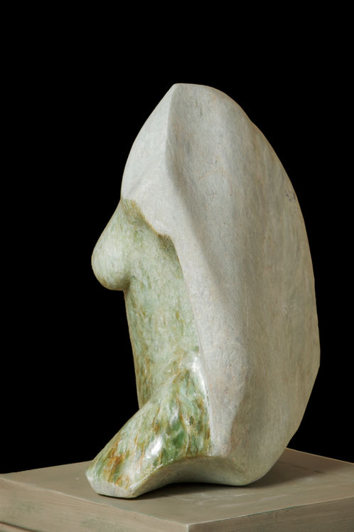 Green Apple soapstone on a black granite base.
18" T x 12" W x 8" D. 