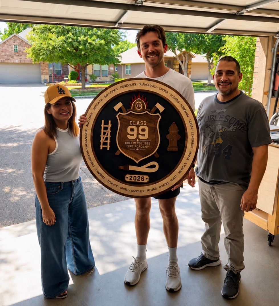 Three people holding a large, round wooden sign.