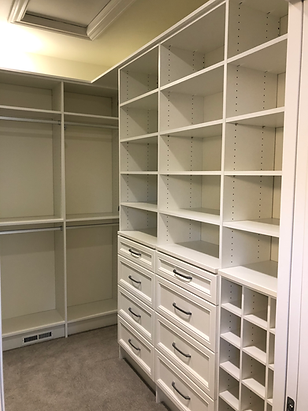 Custom Closet Design and intallation, this one had an irony board, shoe cubbies, drawers,