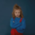 Young child expressing frustration and big emotions, highlighting the importance of gentle parenting strategies to manage tantrums with understanding.