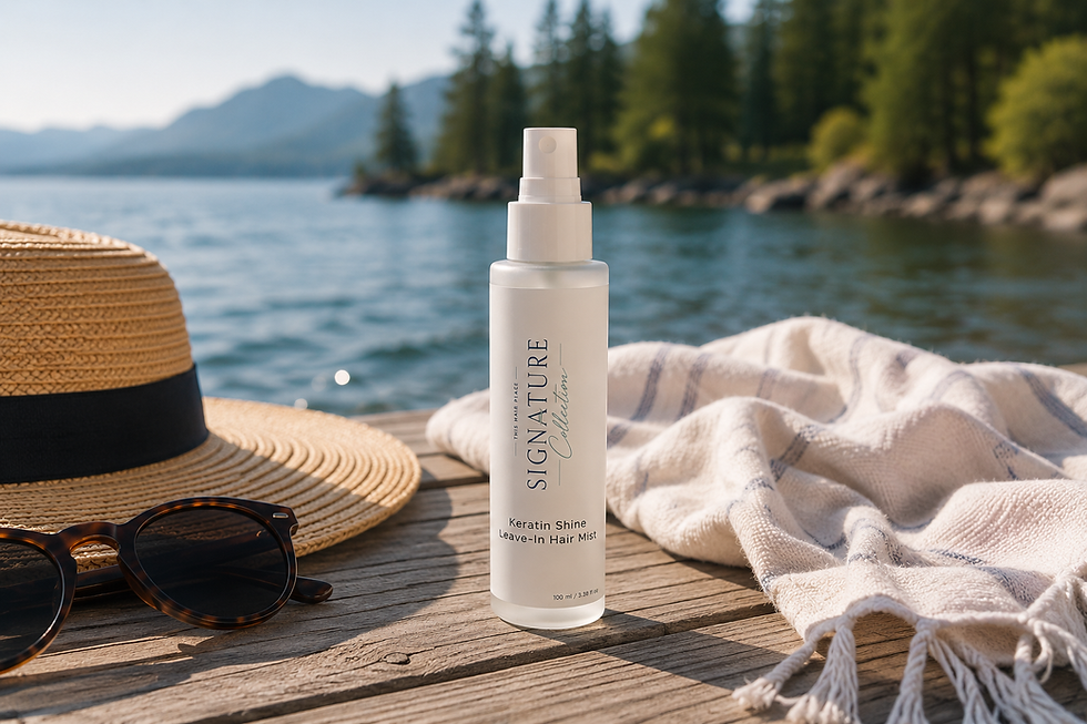 Signature Collection Keratin Shine Leave-In Hair Mist displayed on a dock overlooking a Pacific Northwest lake with a summer hat and sunglasses.