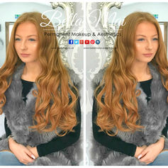 Premium 100% human hair extensions for volume and length at Bella Mai Clinic.