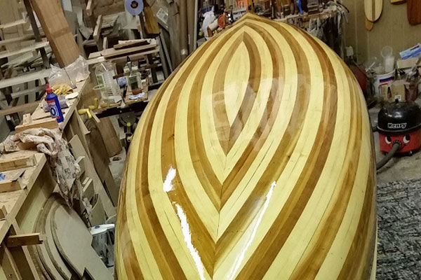 Dabchick wooden canoe underside view.