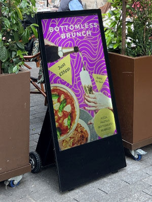 Digital A-board, mobile battery powered advertising display.