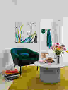 living room with teal green sofa