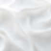white silk material in waves and ripples.jpg
