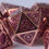 Miniature : Set de dés en Métal Enameled Dragonscale Gears Rose Cuivre