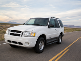 Vehicles for rent. Older model sedans, trucks, and SUVs. 