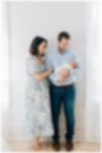 Light and airy newborn session with mom and dad
