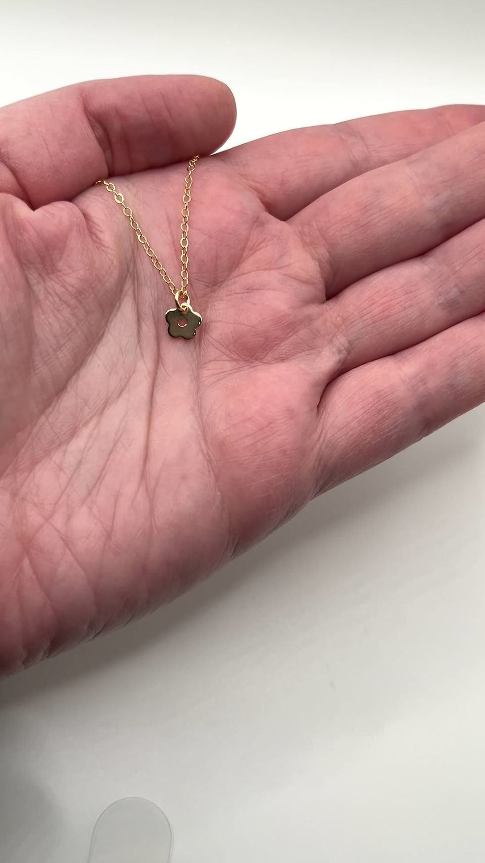 Thumbnail: Tiny Flower Short Gold Necklace