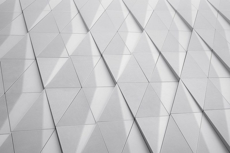 211719-a-white-facade-with-a-geometric-pattern-made-up-of.jpg