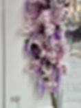 Thumbnail: artificial pink and lilac flower garlands for window display