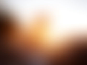 Woman looking at bright sun set