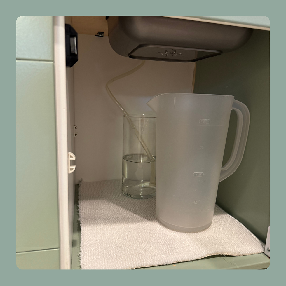 Clean and dirty water below sink