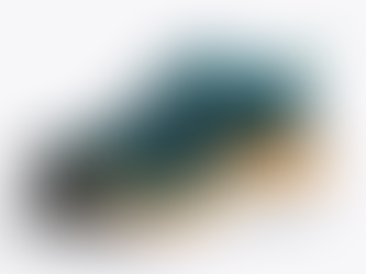 Blue and orange athletic shoe with wavy patterns, shown on a plain white background. Sole is thick with yellow and white layers.