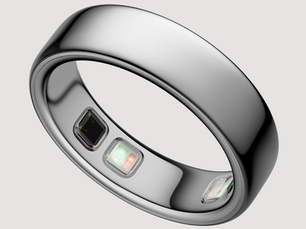 Oura smart ring with small sensor windows on a white background, shown in a sleek product render