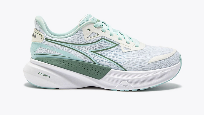 Diadora is one of the most recognisable names in Italian sportswear, but many runners still associate the brand more strongly with football, tennis and retro trainers than modern performance running shoes. That can make its current running range easy to overlook, despite Diadora now producing everything from cushioned daily trainers and stability shoes to trail footwear and a full carbon-plated racing shoe. The latest range also uses several proprietary cushioning technologies, including Anima, Anima N2 and Anima PBX, alongside more established Diadora systems such as Blushield and Duratech 5000. If you're wondering how Diadora running shoes fit into today's market, what the different technologies mean or which current model might suit your running, here's everything you need to know. The History Of Diadora Diadora was founded in 1948 in Caerano di San Marco in northern Italy. The company originally produced handmade hiking and work boots before moving increasingly into sports footwear during the 1960s. During the 1970s, Diadora became increasingly visible in professional sport, working with leading athletes including tennis star Björn Borg and Italian athlete Giuseppe Gentile. Football also became a major part of the company's identity, helping turn Diadora into an internationally recognised sports brand. Running has remained part of the brand for decades, but the current generation of shoes represents a much more modern approach. Diadora now combines its Italian footwear heritage with supercritical foams, high-stack midsoles and carbon-fibre technology, while selected performance running shoes continue to be made in Italy. Why Are Diadora Running Shoes Becoming More Popular? One of the most interesting things about Diadora's current running range is how different it is from the lifestyle trainers many people associate with the brand. Models such as the Cellula 2 and Nucleo 2 are built around modern cushioning and broader platforms, while the Frequenza 2 is aimed at quicker running and the Gara Carbon 3 is a dedicated carbon-plated competition shoe. Diadora has also retained something distinctive through its Made in Italy running programme. The Atomo Star is assembled by hand at Diadora's factory in Caerano di San Marco, while the Atomo V7000-2 is another Italian-made model still available in the range. This gives the company an unusual connection between modern performance footwear and its Italian manufacturing heritage. What Makes Diadora Running Shoes Different? The current Diadora range uses several different midsole materials depending on the purpose of the shoe. The most important names to understand are Anima, Anima N2 and Anima PBX. Anima is Diadora's lighter and more responsive alternative to its traditional EVA Light compound. According to Diadora's own testing, it increases midsole responsiveness while reducing weight, and it is used in shoes including the Nucleo 2 and Atomo V7000-2. Anima N2 is Diadora's supercritical EVA foam and is designed to provide greater responsiveness at a lower weight. It appears in models including the Cellula 2, Frequenza 2 and Atomo Star, giving these shoes a more modern and energetic feel. Anima PBX sits at the performance end of the range. This supercritical foam is used in the Gara Carbon 3 alongside a full-length carbon-fibre plate, with Diadora designing the combination specifically for its fastest road racing shoe. What Is Diadora Blushield? Blushield is one of Diadora's longer-established running technologies and is primarily associated with cushioning and stability. The system is designed to help manage differences in how the foot moves through the running stride while providing a more supportive feeling underfoot. It continues to appear in shoes such as the current Mythos Blushield Vigore V, which Diadora positions around stability and protection. This gives runners wanting additional support a distinct alternative to the neutral shoes that now make up a substantial part of the wider range. What Is Duratech 5000? Duratech 5000 is Diadora's wear-resistant outsole compound and appears across several current running shoes. Models including the Nucleo 2, Cellula 2 and Atomo Star use it in their outsoles, helping protect areas subjected to repeated contact with the road. The purpose is straightforward: running shoe outsoles need to balance grip against durability without adding unnecessary weight. A harder-wearing compound in appropriate areas can therefore help extend the useful life of a training shoe. What Is Heel Drop? Heel drop is the difference in height between the heel and forefoot of a running shoe. Diadora's current range contains a wide spread of drops rather than following one consistent philosophy. Several of its modern trainers use relatively low drops. The Nucleo 2 and Cellula 2 both have a 5mm drop, while the Atomo Star uses 6mm. Different models elsewhere in the range use higher drops depending on the type of running for which they have been designed. A lower heel drop isn't automatically better, and runners accustomed to higher-drop footwear may notice greater loading through the calves and Achilles when switching. Comfort, fit and gradual adaptation remain more important than choosing a shoe simply because of one specification. Read about maximalist and maximalist running shoes here. Does Diadora Make Neutral Running Shoes? Neutral road running shoes make up a substantial part of Diadora's current performance range, covering everyday mileage, longer-distance running and more highly cushioned training. The Nucleo 2 (pictured above) is a neutral shoe for daily training and long-distance running, despite incorporating design features intended to improve inherent stability. The Cellula 2 is also a neutral shoe and combines a wide platform with more generous cushioning, while the Atomo Star provides another neutral option aimed at daily training and longer-distance running. This is worth emphasising because Diadora's long association with Blushield can make it easy to assume that the range is dominated by supportive footwear. In reality, some of its most important current running shoes are neutral trainers. Does Diadora Make Stability Shoes? Diadora continues to offer dedicated stability footwear, with the current Mythos Blushield Vigore V designed specifically to provide stability and protection. There is an important distinction between a dedicated stability shoe and a neutral shoe that happens to have a stable platform. The Nucleo 2, for example, has a wider and asymmetrically shaped midsole designed to improve stability and rotation control, but it remains a neutral model. As with any brand, additional stability shouldn't automatically be assumed to be necessary simply because your foot pronates. Pronation is a normal part of running for many people, and comfort remains an important guide when choosing footwear. Does Diadora Make Carbon Plate Running Shoes? The Gara Carbon 3 is Diadora's current carbon-plated road racing shoe and represents the performance end of the running range. The Gara Carbon 3 combines Anima PBX cushioning with a full-length carbon-fibre plate embedded within the midsole. Diadora has also reduced the weight compared with the previous generation, positioning the current shoe specifically as a race-day model designed around responsiveness and energy return. For most recreational runners, a conventional daily trainer will still make more sense for the majority of weekly mileage. A shoe such as the Gara Carbon 3 is much more specialised and is intended primarily for racing and performance-focused running. Read more about supershoes here. Does Diadora Make Trail Running Shoes? Diadora's current range includes the Sestriere-XT 2, a dedicated trail running shoe designed to handle several different types of off-road terrain. Its XT outsole uses different rubber characteristics across the sole, with harder rubber towards the outside and higher-grip softer rubber centrally. Diadora says the design was inspired by the anatomy of an ibex hoof and developed for conditions including grass, gravel, mud and wet rocks, while DD Anima technology provides the midsole cushioning. Diadora's trail range is much smaller than its road collection, so this isn't currently a brand offering a huge choice of specialist off-road shoes. However, the Sestriere-XT 2 provides a genuine trail specific option rather than simply adapting a road-running model. Which Diadora Running Shoe Is Right For You? Diadora Nucleo 2 The Nucleo 2 is a neutral daily trainer designed for comfortable everyday and long-distance running. Its 5mm drop, Anima cushioning and broad platform make it a strong starting point for runners wanting a versatile road shoe for regular mileage. Diadora Cellula 2 The Cellula 2 is a highly cushioned neutral trainer designed for everyday training and longer-distance running. Its wide platform combines Anima and Anima N2 cushioning, making it particularly suited to runners who prioritise comfort and cushioning during regular mileage. Diadora Atomo Star The Atomo Star is a Made in Italy neutral performance trainer combining Anima N2 cushioning with a 6mm drop. It is designed for daily training and longer distances while providing a lighter and more responsive experience than a traditional highly cushioned trainer. Diadora Frequenza 2 The Frequenza 2 is a lighter, more responsive road shoe aimed particularly at quicker workouts and tempo runs. It uses Anima N2 cushioning but doesn't rely on a carbon plate, making it an option for runners wanting a faster training shoe without moving to a dedicated plated racer. Diadora Mythos Blushield Vigore V The Mythos Blushield Vigore V is aimed at runners wanting additional stability and protection. It uses Diadora's established Blushield approach and provides the clearest dedicated stability option among the current shoes highlighted in the range. Diadora Sestriere-XT 2 The Sestriere-XT 2 is Diadora's dedicated trail running option. Its XT outsole is designed for surfaces including grass, gravel, mud and wet rocks, while DD Anima cushioning helps provide comfort and responsiveness away from the road. Diadora Gara Carbon 3 The Gara Carbon 3 is the race-day performance shoe in the current range. It combines Anima PBX foam with a full-length carbon-fibre plate and is designed for runners looking for a lightweight, highly responsive shoe for road racing. The Gara Carbon 3 Are Diadora Running Shoes Made In Italy? Some are, but not all. Diadora continues to manufacture selected performance running shoes in Italy, with both the Atomo Star and Atomo V7000-2 identified by the company as Made in Italy models. The Atomo Star is assembled by hand at Diadora's factory in Caerano di San Marco, while the Atomo V7000-2 is also assembled there after being developed through the company's own research operation. This gives the Atomo family a distinctive connection with Diadora's Italian heritage, but it would be inaccurate to suggest that the entire running range is manufactured in Italy. Are Diadora Shoes Sustainable? Diadora has introduced recycled and lower-impact materials into parts of its footwear range, although these measures don't apply equally to every running shoe. The current Sestriere-XT 2, for example, incorporates recycled polyester mesh alongside virgin fabric in its upper. It is better to describe these developments as attempts to reduce the environmental impact of particular materials rather than suggesting that Diadora running shoes are environmentally neutral. Running footwear still combines numerous foams, rubbers, fabrics, adhesives and other components, making sustainability considerably more complicated than the use of a single recycled material. Are Diadora Running Shoes Worth It? Diadora is much easier to take seriously as a specialist running brand than its relatively modest profile among UK runners might suggest. The current collection contains clearly differentiated shoes for neutral training, higher cushioning, stability, faster workouts, trail running and carbon-plated racing. The strongest aspect of the range is arguably how many different types of road running it now covers. The Nucleo 2 provides a versatile neutral training option, Cellula 2 increases the emphasis on cushioning, Frequenza 2 is designed for faster training and Gara Carbon 3 provides the dedicated race-day choice. Atomo Star then adds something genuinely distinctive through its combination of modern performance technology and Italian manufacturing. There are still limitations, particularly because the trail range is much smaller than the road collection and some of Diadora's technology names aren't immediately obvious to runners encountering the brand for the first time. Even so, runners who dismiss Diadora because they mainly associate the name with football boots or retro trainers could be overlooking a genuinely capable modern running range. Frequently Asked Questions Are Diadora Running Shoes Good For Beginners? Yes. Diadora produces several shoes suitable for new runners, particularly neutral daily trainers such as the Nucleo 2 and more highly cushioned models such as the Cellula 2. The most important thing for a beginner remains finding a shoe that feels comfortable and fits properly. There is no need to choose the most technically advanced or expensive model simply because you are starting to run. Who Makes Diadora Running Shoes? Diadora is an Italian sportswear company founded in 1948 in Caerano di San Marco. It produces running shoes alongside footwear and clothing for several other sports. The company retains a particularly strong connection with Italy through selected running models that continue to be assembled at its own factory. However, not every Diadora running shoe is manufactured in Italy. Are Diadora Running Shoes Available In The UK? Yes. Diadora operates a dedicated UK online store carrying a substantial selection of its current running footwear, including neutral trainers, stability shoes, performance models and trail footwear.Availability can vary by model, size and colour, so runners looking for a particular shoe may also want to check specialist running retailers. Does Diadora Make Shoes For Marathon Running? Shoes such as the Nucleo 2, Cellula 2 and Atomo Star are designed for regular road mileage and longer-distance running, making them potential options for marathon training depending on the individual runner. The Gara Carbon 3 provides a separate carbon-plated race-day option for runners who want a more specialised performance shoe. A carbon plate isn't necessary for running a marathon, however, and comfort over the full distance remains far more important. Are Diadora Running Shoes Made In Italy? The Atomo Star and Atomo V7000-2 are both currently identified by Diadora as Made in Italy running shoes and are assembled at the company's factory in Caerano di San Marco. It would be incorrect, however, to assume that every Diadora running shoe is manufactured in Italy. Made in Italy is a feature of selected models rather than the whole collection. How Long Do Diadora Running Shoes Last? There isn't a fixed mileage that applies to every Diadora running shoe. Durability will vary according to the model, running surface, body weight, gait, how frequently the shoes are used and the materials used in their construction. Diadora uses its Duratech 5000 wear-resistant outsole compound on several current models, but runners should still monitor changes in cushioning, grip and overall comfort rather than replacing shoes solely because they have reached an arbitrary mileage figure. Final Thoughts Diadora has a much stronger modern running range than many runners may realise. Behind the familiar Italian brand name is a collection that now includes neutral daily trainers, highly cushioned road shoes, stability footwear, faster non-plated models, a dedicated trail shoe and the carbon-plated Gara Carbon 3. The range becomes easier to understand once the main models are separated by purpose. Nucleo 2 is the versatile neutral trainer, Cellula 2 provides more cushioning, Frequenza 2 handles faster training, Mythos Blushield Vigore V provides additional support, Sestriere-XT 2 covers the trails and Gara Carbon 3 sits at the race-day end of the collection. Atomo Star then gives Diadora something particularly distinctive through its combination of modern running technology and Made in Italy production. If you're considering Diadora running shoes, start with the type of running you do and identify the model designed for that purpose. Fit and comfort should then be the deciding factors rather than choosing a shoe simply because of Diadora's heritage, where it was manufactured or the amount of technology listed in its specification.