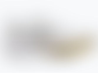White Joma running shoe with gold accents and black J logo, labeled R-2000 and Fly Reactive, on a plain white background
