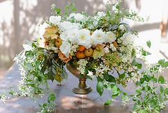 flower centerpiece with kumquats