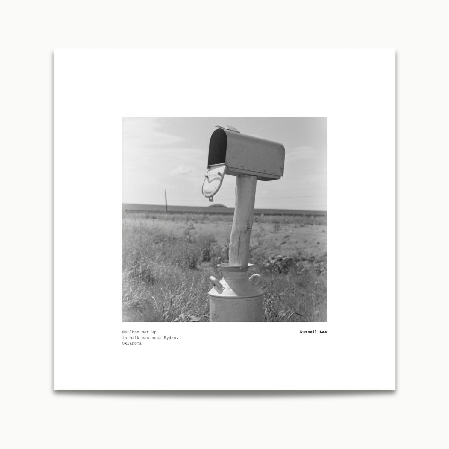 Russell Lee | Mail box set up in milk can near Hydro, Oklahoma