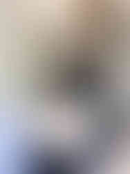 Double vanity separated by ceiling height tower