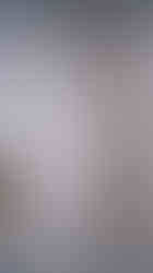 Close up of the power message shower panel and quilted patterned tile shower surround