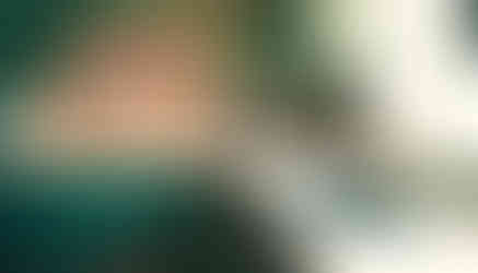 Close up of under mount 27" rectangle kitchen sink set in quartzite counter top