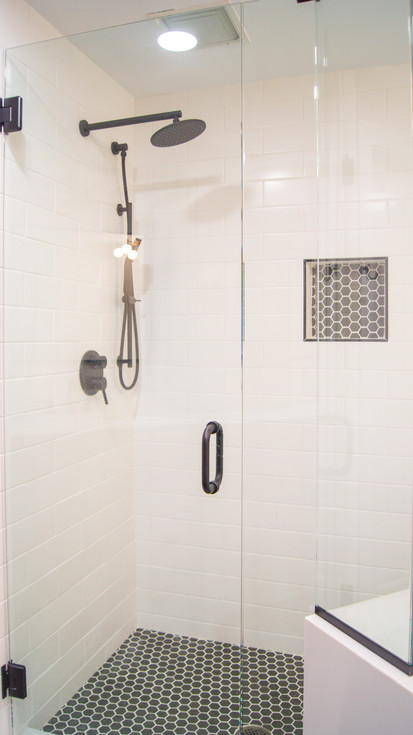 Walk-in shower with clear glass door