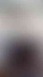 A tea pot on the built in stove and range hood in The Royal Frosting Kitchen by Barrett Home Renovations