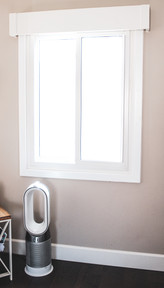 Trim is mitered and caulked to a smooth finish with base molding to match