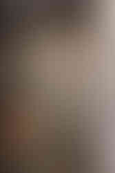 View through the glass wall of the Purrfect pebble stone shower by Barrett Home Renovations